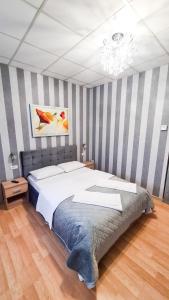 Кровать или кровати в номере Casa Millelune