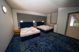 Postel nebo postele na pokoji v ubytování Popas Turistic Transfagarasan
