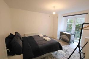 Giường trong phòng chung tại Apartment - Heart of London!