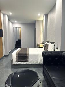 Postel nebo postele na pokoji v ubytování LION 9 HOTEL