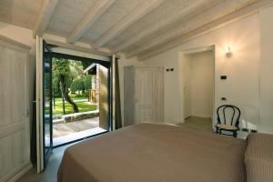 Katil atau katil-katil dalam bilik di Al segnavento Tramontana +33 gambar
