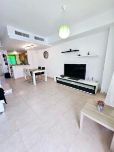 Telewizja i/lub zestaw kina domowego w obiekcie CASA DEl SOL PLAYA PUERTO BLANCO