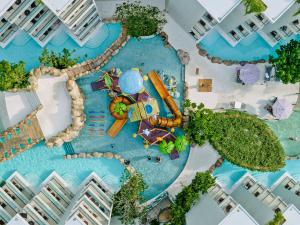 an overhead view of a water park at a resort at Phuket Emerald Beach Resort in Karon Beach