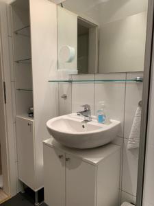 Koupelna v ubytování Ferienwohnung Leevke + 18 fotografií