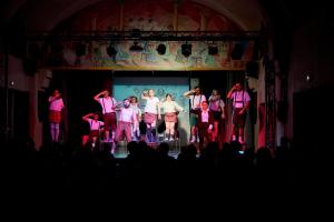 a group of people standing on a stage at Villages Clubs du Soleil - SUPERBAGNERES in Superbagnères