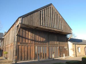 a large wooden barn with its door open at 3 bed in Bakewell 53896 in Bakewell