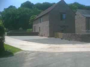 a large brick building with a driveway in front of it at 3 Bed in Wells 55232 in Chewton Mendip