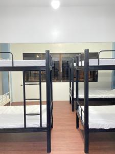 Postel nebo postele na pokoji v ubytování Lime Lite Manila Hostel