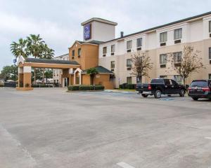 a large parking lot in front of a hotel at Sleep Inn Scott-Lafayette West in Scott