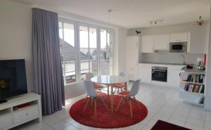 Η κουζίνα ή μικρή κουζίνα στο Apartmentvermittlung Mehr als Meer - Objekt 18