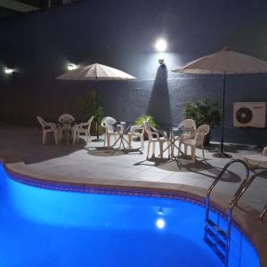 Bazén v ubytování Hotel Alcala del Rio nebo v jeho okolí