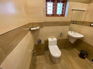 Koupelna v ubytování Grand Residency & Resort
