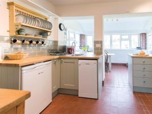 a kitchen with a sink and a counter top at 3 bed property in Harrogate District HH057 in Harrogate