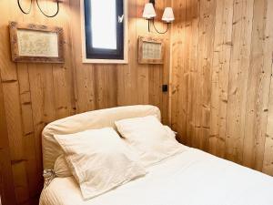 Postel nebo postele na pokoji v ubytování Appartement 6 personnes aux 2 Alpes, au pied des pistes - Wi-fi, Parking gratuit, Terrasse vue sur jardin