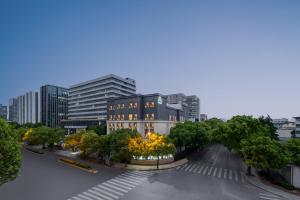 a rendering of a city street with a building at Atour Hotel Shanghai Hongqiao Xinzhuang Business District in Shanghai