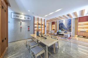 a room with a table and chairs in a store at Atour Hotel Potala Palace Lhasa in Lhasa +49 photos