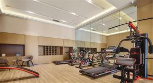 a gym with a bunch of exercise bikes in it at Atour Hotel Yingxiongshan Road Jinan in Jinan