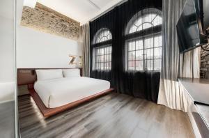 Postel nebo postele na pokoji v ubytování Z Hotel Shanghai Bund Shamei Building