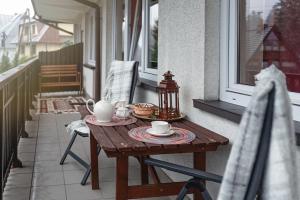 Posedenie v ubytovaní Apartament Karpielówka View Od-nowa