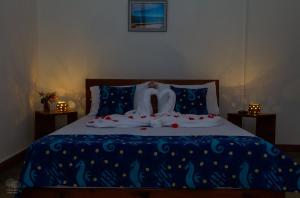 En eller flere senge i et værelse på Canto das Amêijoas