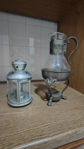 a blender and a candle on a table at Ipoh Center Elegant Bungalow Near to Sunway in Ipoh