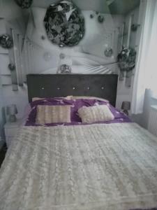 Llit o llits en una habitació de Apartament Oaza Spokojna 24