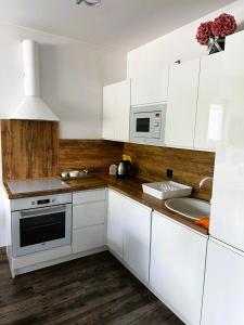 Cuina o zona de cuina de Apartament Oaza Spokojna 24