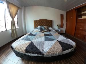 Кровать или кровати в номере Casa Tranquila