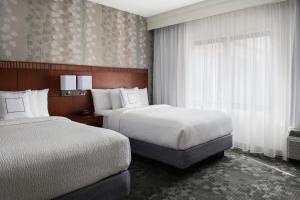 Postel nebo postele na pokoji v ubytování Courtyard by Marriott Mahwah