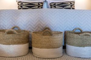 A bed or beds in a room at 3 Caves by Caldera Houses
