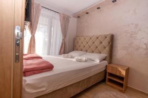 Letto o letti in una camera di Green Hill Isidorovic Divcibare
