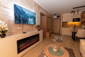 TV o dispositivi per l'intrattenimento presso Green Hill Isidorovic Divcibare