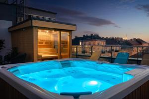 a hot tub on the roof of a building at Onyx Luxury Budapest in Budapest