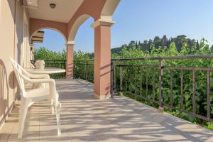 A balcony or terrace at Natasa Studios Még 19 kép