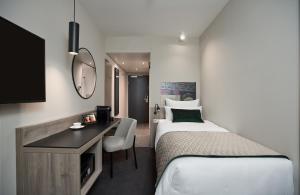 Posteľ alebo postele v izbe v ubytovaní Leonardo Hotel Vienna City West + 26 fotografií