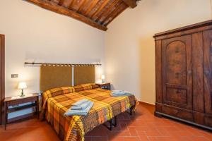 Katil atau katil-katil dalam bilik di Bella Toscana Relax +35 gambar