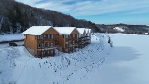 an aerial view of a building in the snow at Keweenaw Waters Resort in Houghton