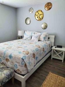 Ένα ή περισσότερα κρεβάτια σε δωμάτιο στο “Sandprints”