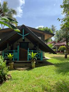 a church with a cross on the front of it at Lobo's Villa in Kurunegala