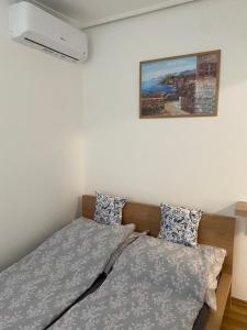 Katil atau katil-katil dalam bilik di Mákvirág Apartman