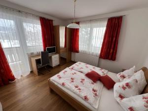 Postel nebo postele na pokoji v ubytování Haus Alpina Ski In & Ski Out