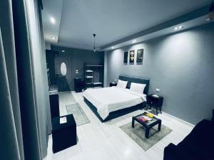 Postel nebo postele na pokoji v ubytování Rove Residence New Cairo