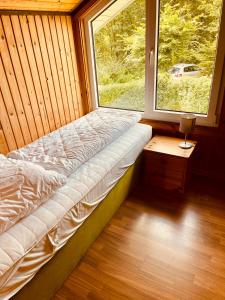 Ένα ή περισσότερα κρεβάτια σε δωμάτιο στο Extertal-Ferienpark - Premium Ferienhaus Sauna Wandern #56a