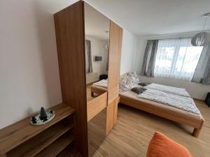 Postel nebo postele na pokoji v ubytování Haus Alpina Ski In & Ski Out
