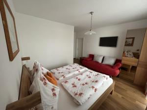 Postel nebo postele na pokoji v ubytování Haus Alpina Ski In & Ski Out