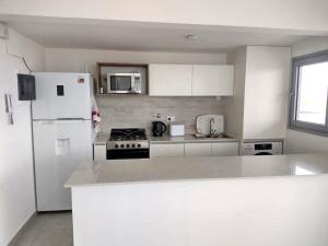 Køkken eller tekøkken på Al Mar Torres del Este - Monte H del Este