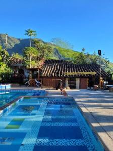 สระว่ายน้ำที่อยู่ใกล้ ๆ หรือใน Finca y piscina La Blanquita en Ancuya Nariño Colombia