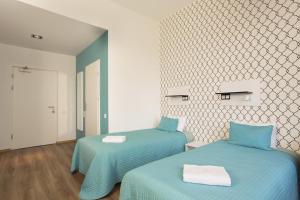 Hotel Traffic Poznań Stare Miasto客房内的一张或多张床位