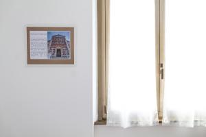 a picture of a building in a window at ShortMi Balilla in Milan
