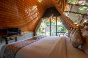 Postel nebo postele na pokoji v ubytování Mangoforest Bali